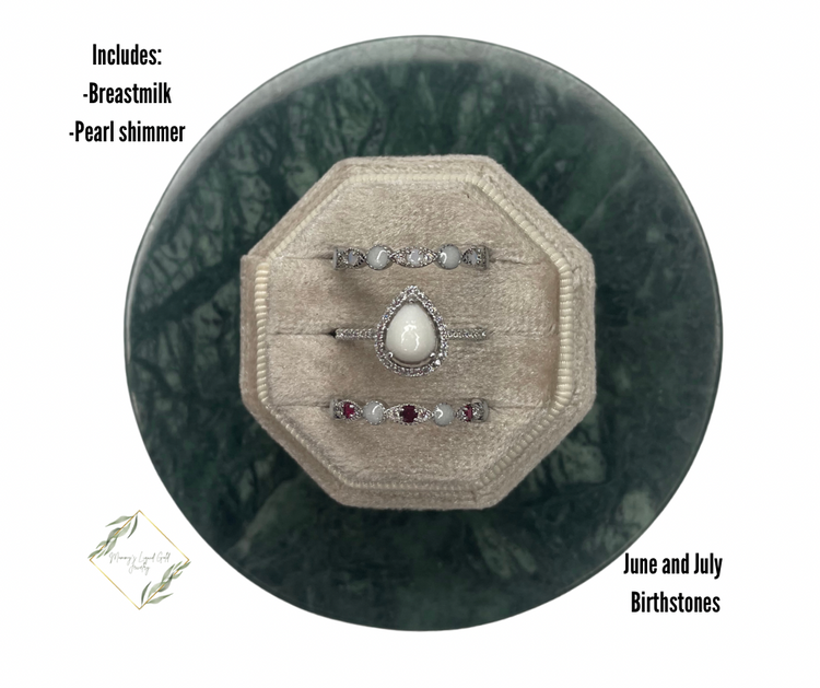 Teardrop ring with birthstone bands