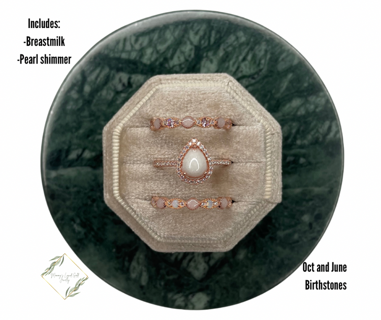 Teardrop ring with birthstone bands