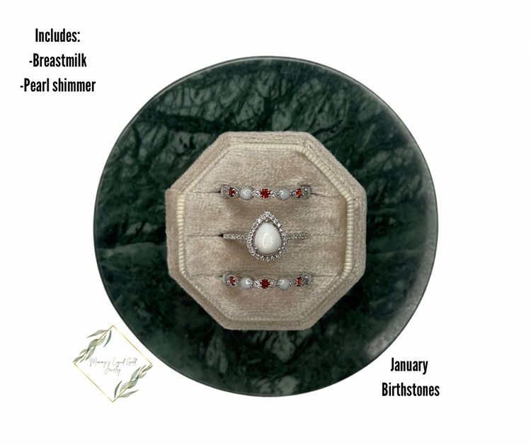 Teardrop ring with birthstone bands