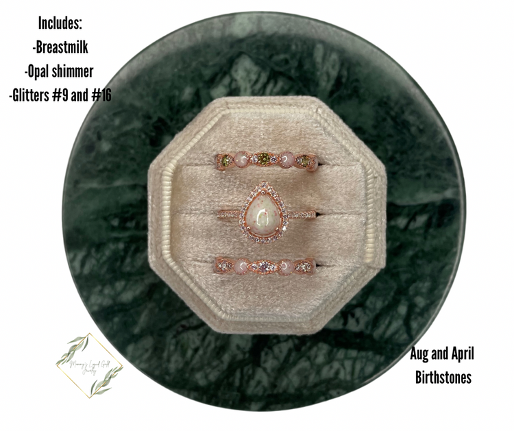 Teardrop ring with birthstone bands