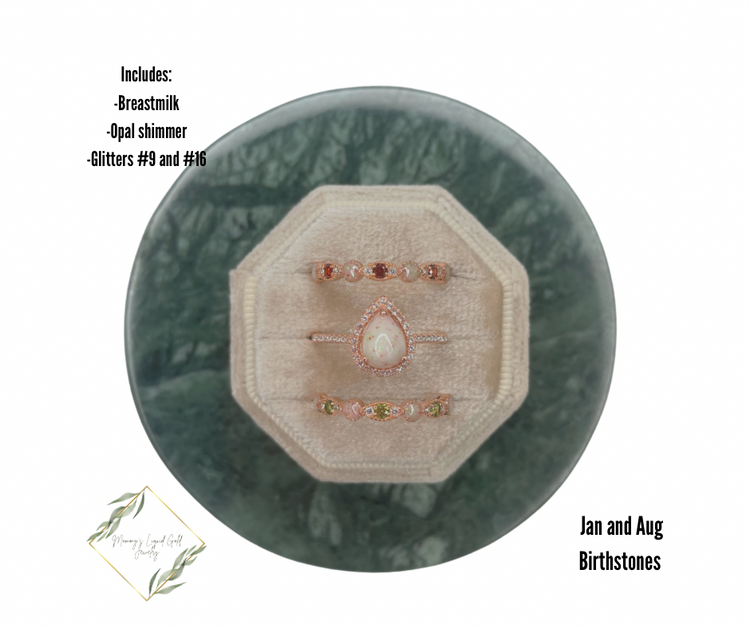 Teardrop ring with birthstone bands