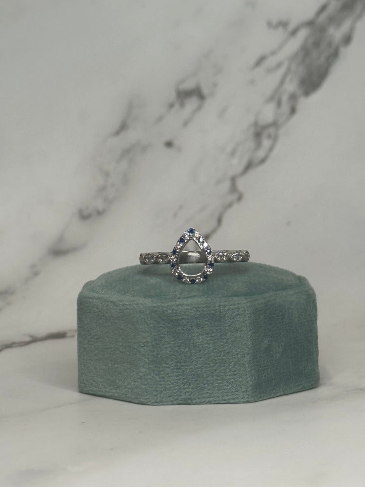 9.5 teardrop ring. Sept stone every other stone