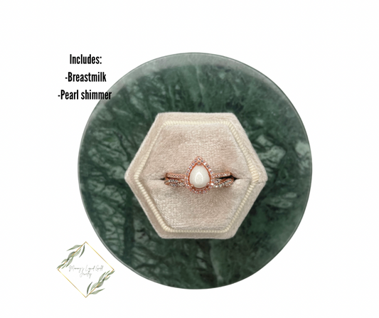 Teardrop ring with braided accent band