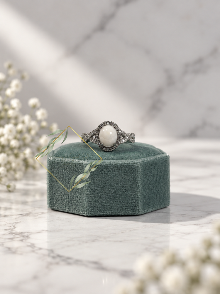 Oval ring with infinity band